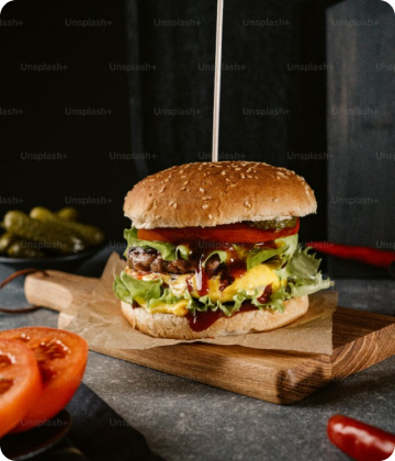 Burger on chopping board.